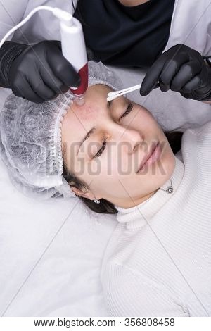Cosmetologist Making Mesotherapy Injection. Microneedle Mesotherapy. Treatment Woman At Beautician. 