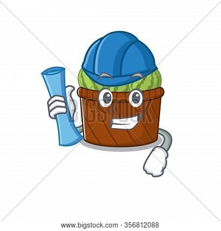 Smiling Architect Of Watermelon Fruit Basket Having Blue Prints And Blue Helmet