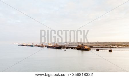 Fawley, England - October 29:  Oil Tankers Docked Beside Fawley Oil Refinery On October 29, 2016.  T