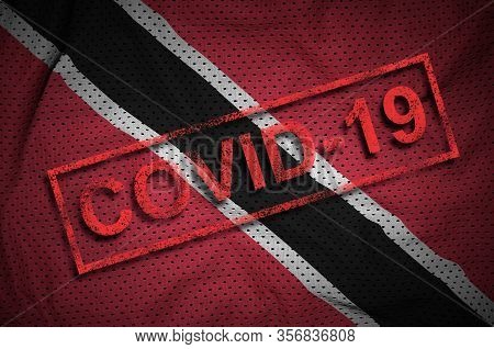 Trinidad And Tobago Flag And Red Covid-19 Stamp. Coronavirus 2019-ncov Outbreak