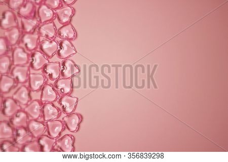 Valentines Day Concept. Glass Transparent Hearts On Pink Background, Glass Heart Glows, Glass Painti