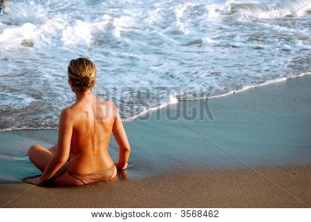 Woman contemplates Strand