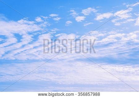 White Clouds In Blue Sky, Background . Altocumulus Cloud Formation. Color Tinting