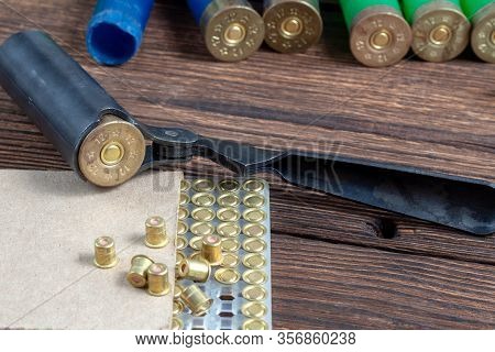 Reloading Process Shotgun Shells With Special Reload Equipment. Powder, Bullets, Fraction, Shells, B