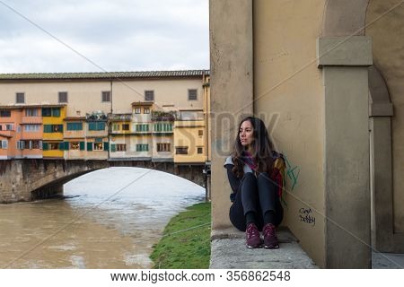 Florence, Italy - 12, March, 2018: Horizontal Picture Of Beautiful Model Posing Close To Ponte Vecch