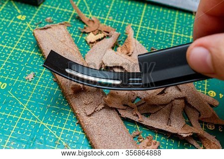 Thinning Brown Leather Stripe With Skiver Tool. Leather Craft Hobby