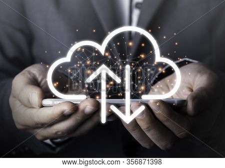 Businessman Holding Mobile Phone Which On The Top Of Phone Has Upload And Download Cloud Space Compu
