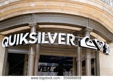 Bordeaux , Aquitaine / France - 09 18 2019 : Exterior Shop Of Quiksilver Store With Logo Roxy And Dc
