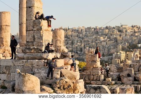 Amman, Jordan - February 15, 2020. Unidentified People At Sunset In Amman Citadel, Jordan. The Amman