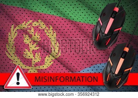 Eritrea Flag And Two Computer Mouses. Misinformation During Coronavirus Or 2019-ncov Virus Concept