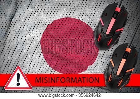 Japan Flag And Two Computer Mouses. Misinformation During Coronavirus Or 2019-ncov Virus Concept