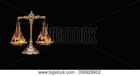 Scales With Burning Tasses On A Black Background