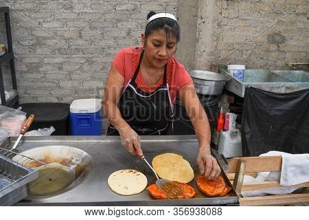 Old Woman Preparing A Typical Mexican Food