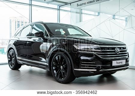 Novosibirsk, Russia - March 09, 2020:  Black Expensive Volkswagen Touareg, Front View.  New Modern C