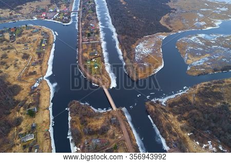 Over The Crossroads Of The Svirs Canals And The Voronezhka River On March Day (aerial Photography). 