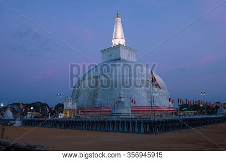 View Of The Ruwanweli Maha Seya Dagoba In The Evening Twilight. Anuradhapura, Sri Lanka