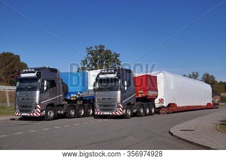 A Truck With A Special Semi-trailer For Transporting Oversized Loads. Oversize Load Or Exceptional C