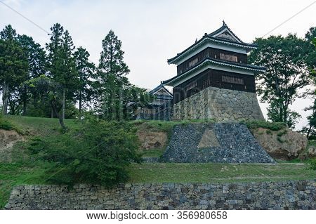 Traditional Japanese Castle On Stone Hill. Ueda Castle Historic Building In Nagano, Japan