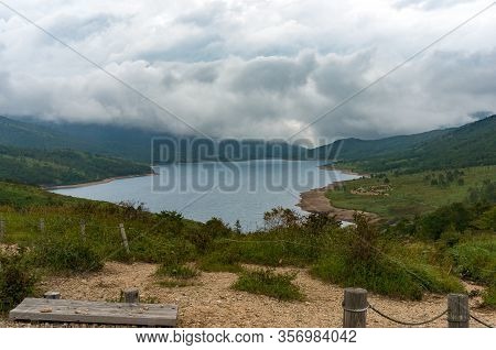 Mountain Lake Landscape. Nozori Lake, Dam Surrounded By Mountains. Gumna, Japan