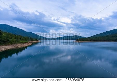 Mountain Lake Landscape. Nozori Lake, Dam Surrounded By Mountains. Gumna, Japan