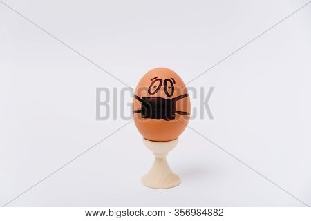 Chicken Egg With Medical Mask , Easter Egg On White Background