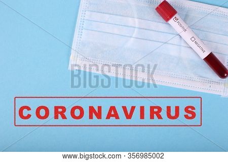 Positive Covid-19 Test And Medical Mask. Copy Space. Medicine Infectious Concept. Pandemia