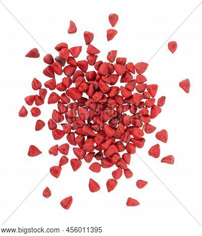 Annatto Seeds, Isolated On A White Background. Achiote Seeds, Bixa Orellana. Natural Dye For Cooking