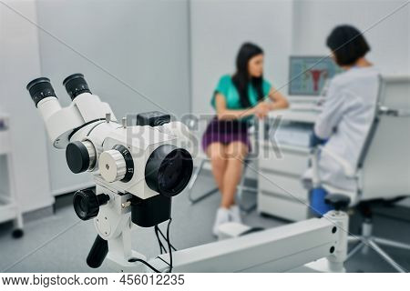 Colposcopy, Examination Of Cervix. Colposcope Close-up Over Gynecological Consultation Of Woman Pati