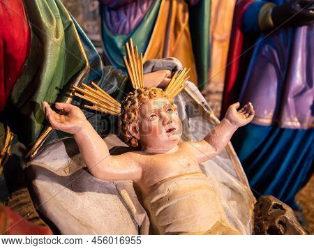 Feldkirch, Austria - January 21, 2022: The Christmas Figure Of The Newborn Jesus In The Manger