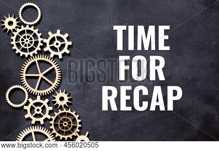 A Sheet Of Craft Paper With Time For Recap Text Attached To A White Textured Wall With A Button. Off