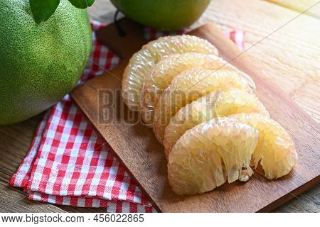 Pomelo Fruit On Wooden Background, Fresh Green Pomelo Peeled And Leaf Frome Pomelo Tree , Pummelo , 