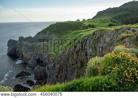 Cliffs And Green Pastures,atlantic Ocean Bay Near Bakio, Small Touristic Village, Basque Country, Sp