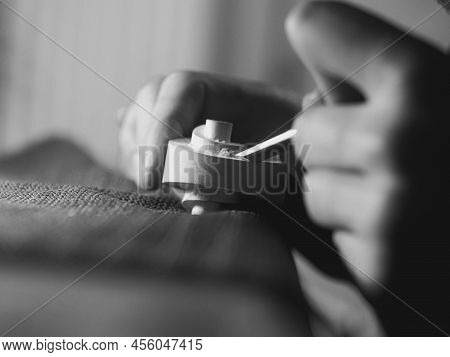 Violinmaker Working On A Handmade Contemporary Stringed Instrument Scroll