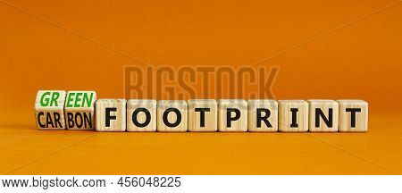 Green Or Carbon Footprint Symbol. Turned Wooden Cubes And Changed Words Carbon Footprint To Green Fo