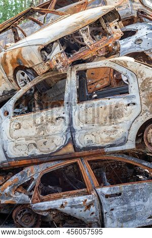 A Lot Of Rusty Burnt Cars In Irpen, After Being Shot By The Russian Military. Russia's War Against U