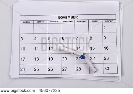 No Smoking Day In 21 Of November. White Month Calendar. Broken Cigarette On The Push Pin.