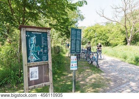 Uccle - Forest, Brussels Capital Region  Belgium - 05 17 2020 Sign, Entrance, People And Bicycles At