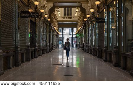 Brussels Old Town, Brussels Capital Region - Belgium - 04 09 2020 Woman Walking Alone Through The De