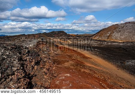 Beautiful Colourful Icelandic Landscape Lava Fields Mountain Geysers Zigzag Road And Moss-covered St
