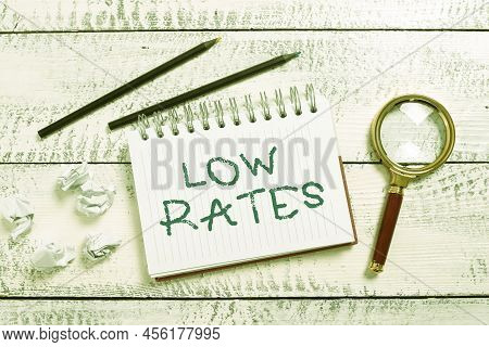 Text Showing Inspiration Low Rates. Word For A Cost Of An Item Or Service Which Is Usualy At Its Sma