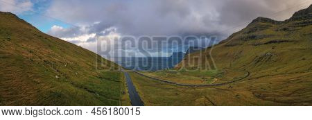 Small Village Of Trollanes Near Kallur Lighthouse On Kalsoy Island In Daytime, Faroe Islands, Denmar