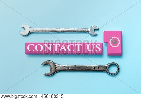 Sign Displaying Contact Us. Internet Concept Group Of Person That Rendering Costumer Service Through