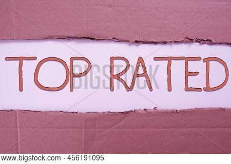 Sign Displaying Top Rated. Concept Meaning The High Amount Of A Charge Or Payment Based On Calculati