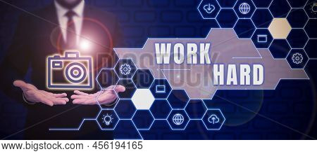 Text Sign Showing Work Hard. Business Showcase Laboring That Puts Effort Into Doing And Completing T