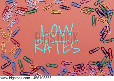Writing Displaying Text Low Rates. Concept Meaning A Cost Of An Item Or Service Which Is Usualy At I