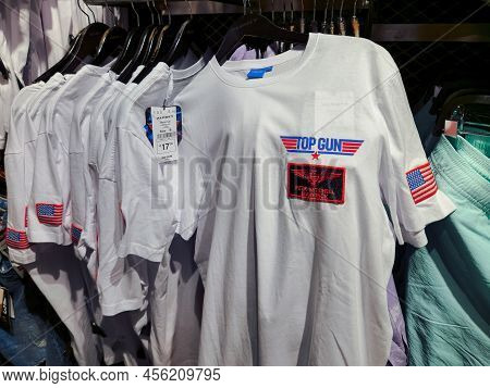 Naples, Italy - June 03 2022: Top Gun Maverick Movie T-shirt Clothing With Logo At Interior Showcase
