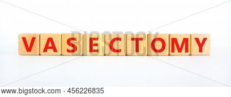 Vasectomy Symbol. Concept Words Vasectomy On Wooden Blocks. Beautiful White Table White Background. 
