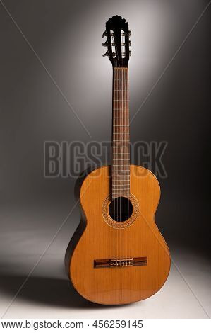 Classical Guitar On A Grey Background  With Copy Space