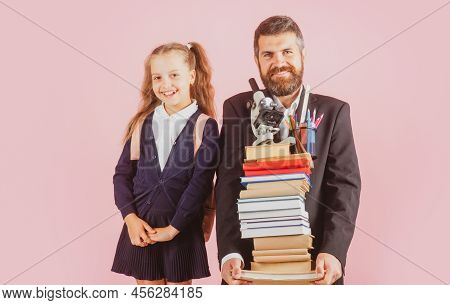 Little School Girl And Fether Teacher With Hold A Books With School Bag Is Back To School, Empty Spa