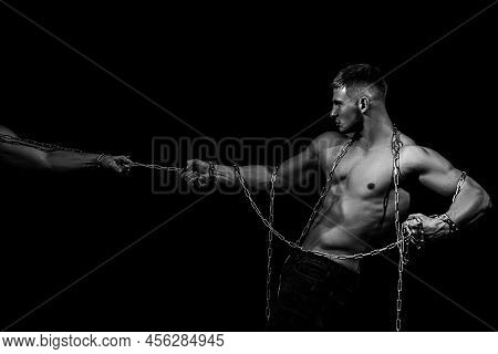 Helping Hand Concept, Support And Outstretched, Isolated On Black. Salvation Help. Man Hands In Powe
